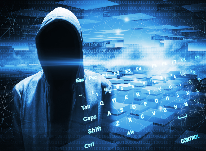 Hacker in a hood on dark blue digital background